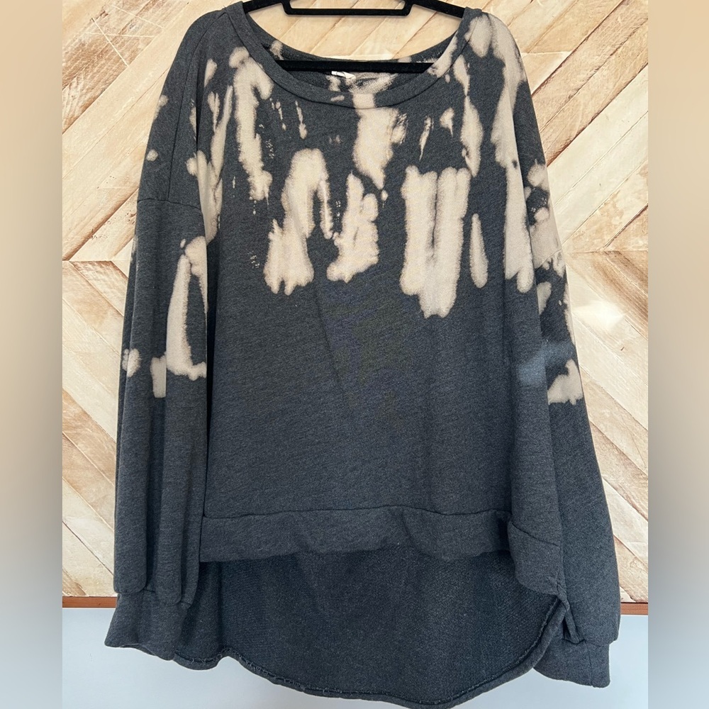 Women’s bleached tunic with distressed cutouts